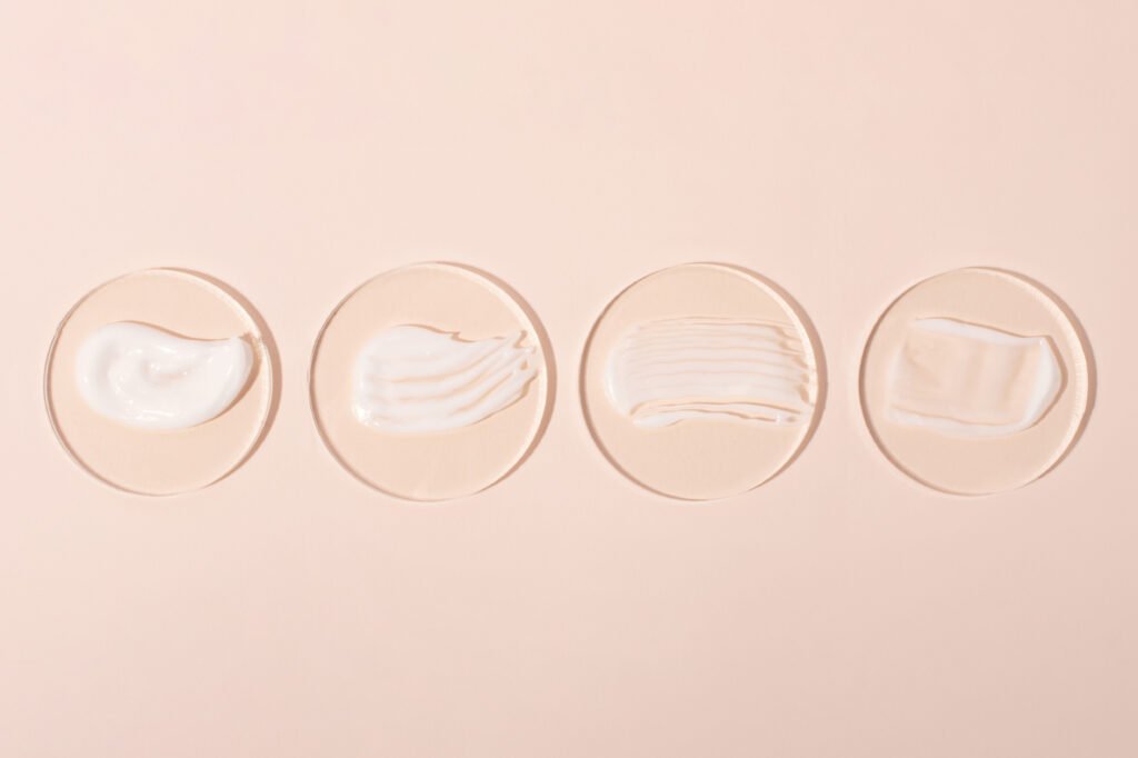 top view of the cosmetic cream on the acrylic podiums,different swatches.pastel colors,copy space.good as cosmetics mockup.horizontal photography.